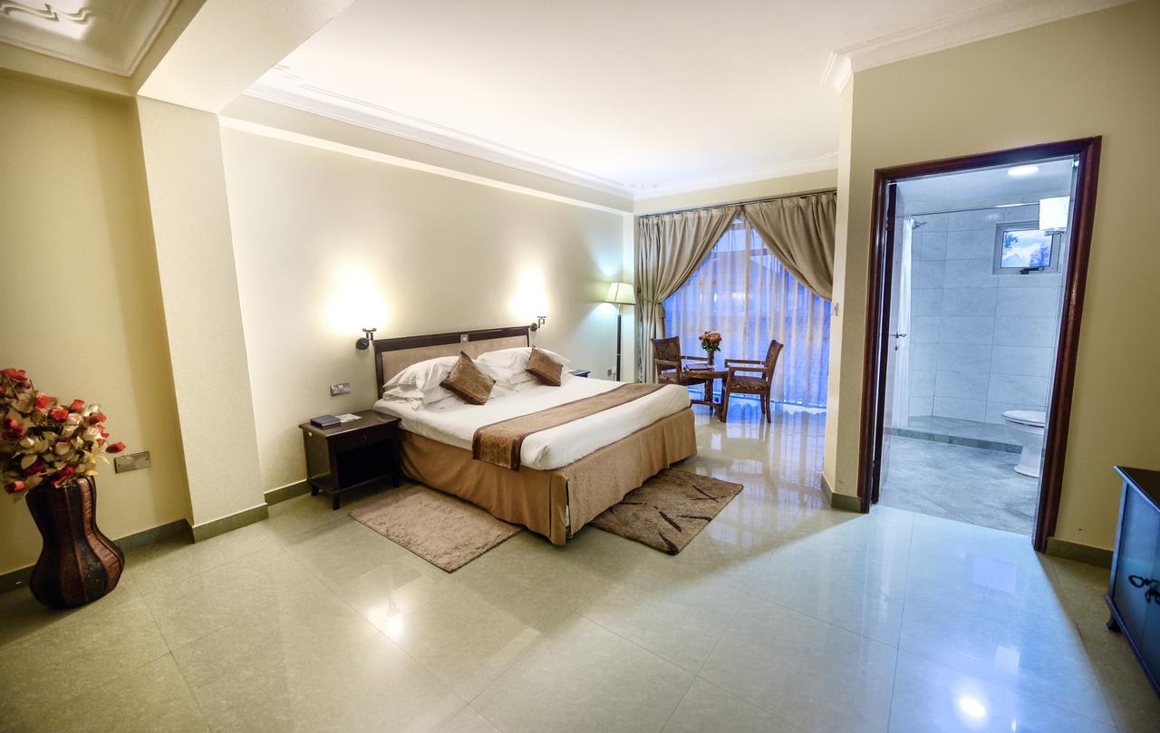 Hotel Sojovalo Kampala Bagian luar foto